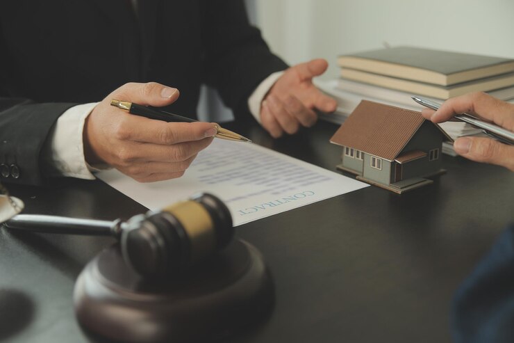 business-lawyers-discussing-contract-papers-with-brass-scale-desk-office-law-legal-services-advice-justice-law-concept-picture-with-film-grain-effect